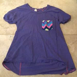 Purple workout shirt.